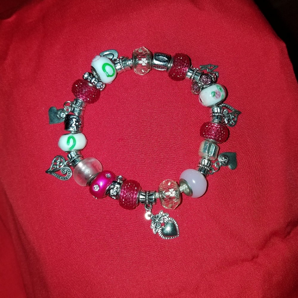 A murano glass heart charm bracelet